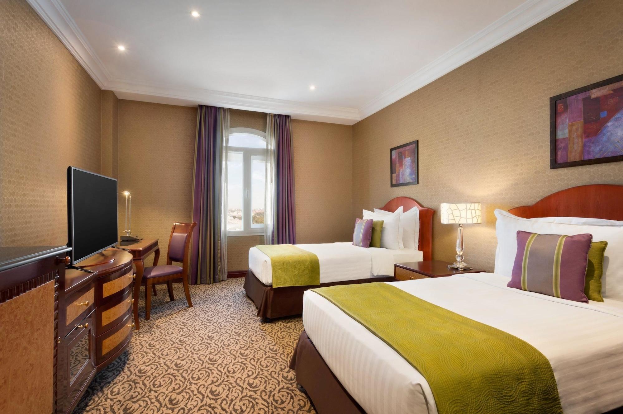 Grand Regency Doha, Trademark Collection By Wyndham Exterior photo Deluxe Room