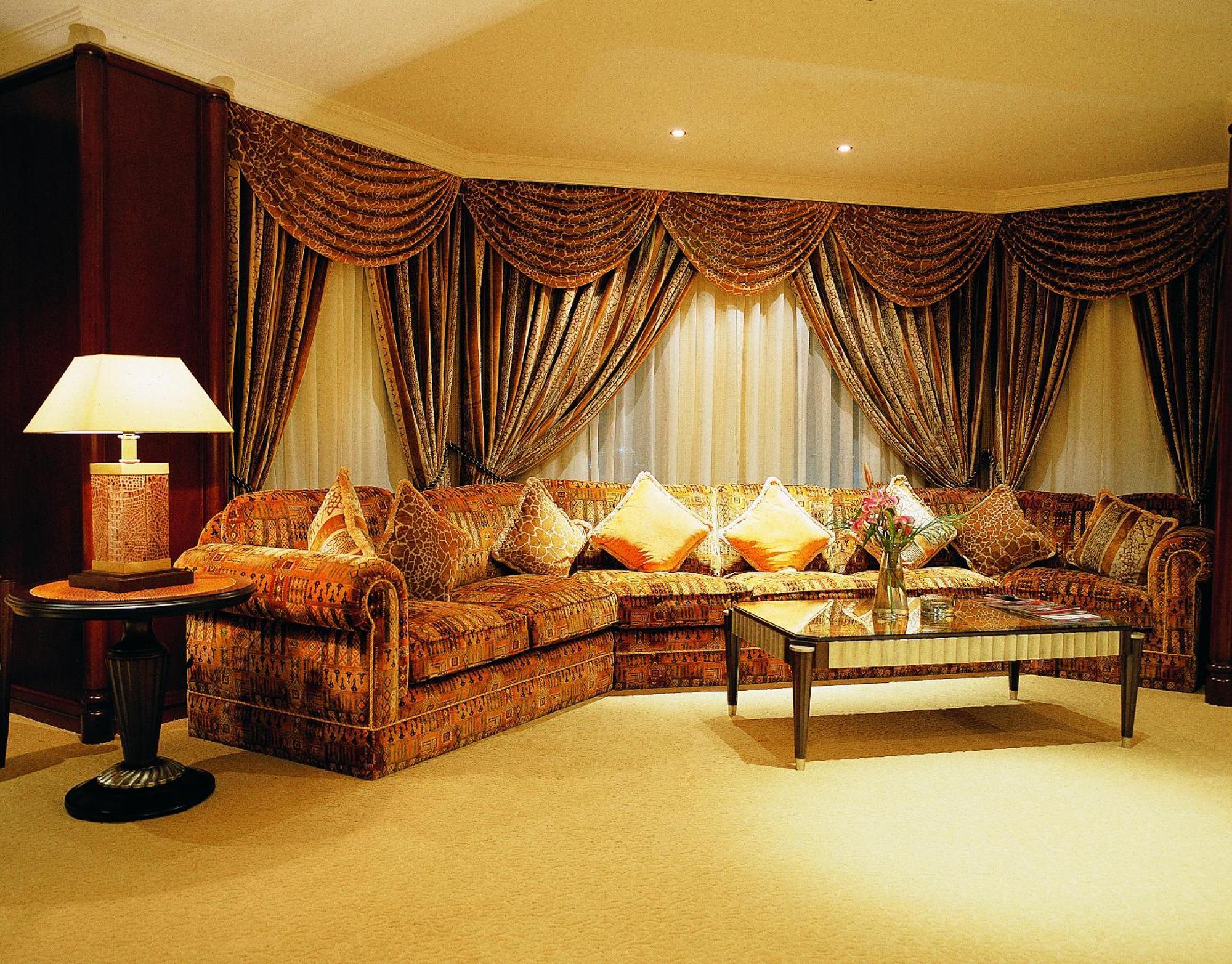 Grand Regency Doha, Trademark Collection By Wyndham Exterior photo A living room